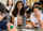 teenage students watch science demonstration