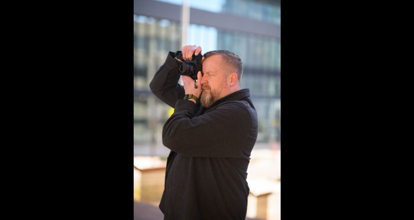 Colin Fox taking a photo